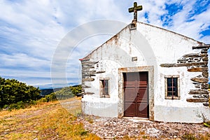 View on small chapel on mountain next to village of Provesende in Douro region, Portugal