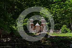 Small chapel surrounded by trees in Kranjska Gora, Triglav Park, Slovenia