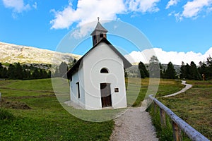 Small chapel in a village of the Dolomites