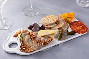 Small charcuterie board for two served with martinis