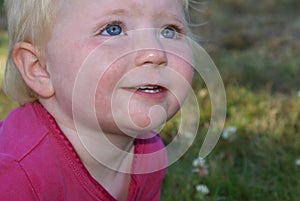 Small child looking upward