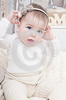 A small child in natural tissue diapers, eco-friendly cotton diapers