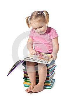 Small child reading a book