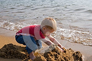 Small child and sea.