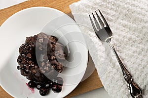 Small Chocolate Bunt cake with a fork.