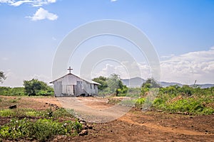 Small christian church in rural african area photo