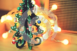 Small Christmas tree with dolls and decoration gift for using in holiday celebration of Christmas time of people in daily life