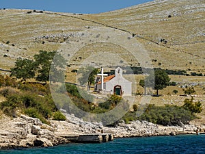 Small church in Archipelago - Islands of the Kornati archipelago panorama landscape of national park in Croatia view from the sea