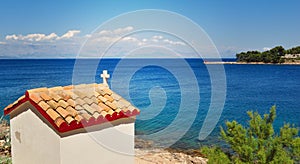 Small church on the cliff overlooking the sea