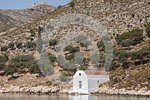 Small church on the coastline of Kastelorizo photo