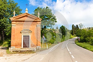 Small church in countryside in a spring day in Tuscany, Italy