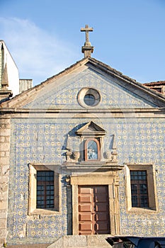 Small church covered with blue tiles on Porto River bank