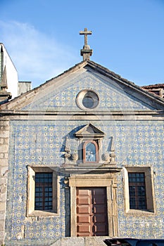 Small church covered with blue tiles on Porto River bank