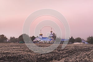 A rustic small church with different compositions and lights.