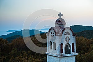 Small church in Greek coastal landscape at sunset, Sithonia