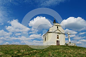 Small church on a green hill