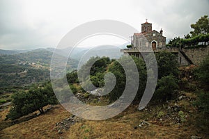 A small church on a hilltop on the island of Crete