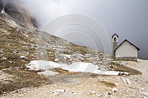 Small church in mountains tracks of the Tre Cime di Lavaredo Dr