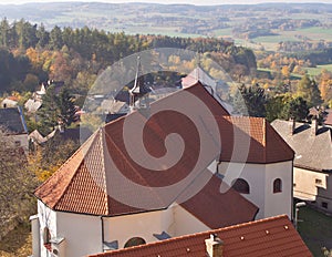 Small church on the rock just by the Lipnice nad SÃ¡zavou gothic style castle, one the biggest castles in teh Czech republic.