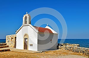 Small church by the sea in Chersonissos on the island of Crete, Greece