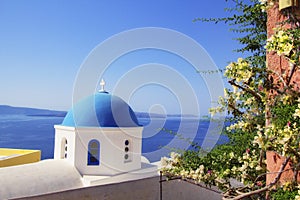 A small church on the streets of Oia on the island of Santorini, Greece