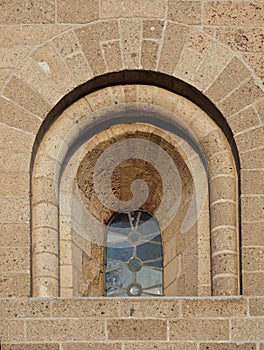 Small church window at sundown