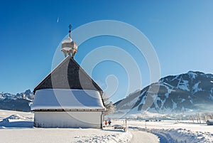Small Church in Winter in the Austrian Alps.