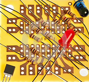 Small Circuit board with resisters on it photo