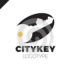 Small city Logo of the builder, house key isolated. Silhouette of the city`s architecture. Vector illustration.