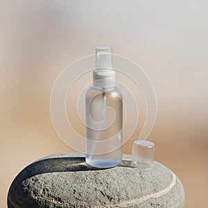 A small, clear plastic spray bottle