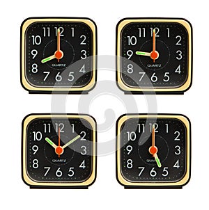 Small clocks showing various time of the day