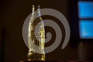 small Coca-Cola bottle backlit