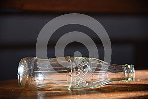 small Coca-Cola bottle backlit