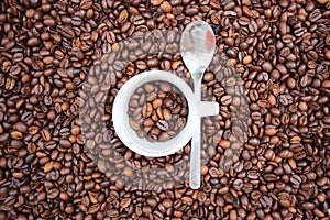 Background with many coffee beans. photo