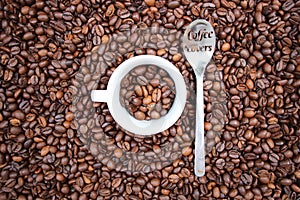 Background with many coffee beans. photo