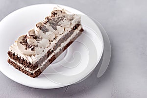 Small Coffee Chocolate Cake on White Plate Grey Background Tasty Beautiful Dessert Chocolate Cake Pastry Close Up Copy Space