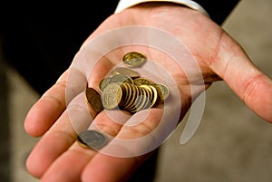 Coin in hand