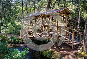 Small colorful covered wooden bridge - Parque Arvi, Medellin, Co