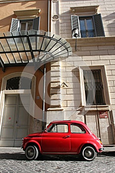 Small compact vintage car and windows photo