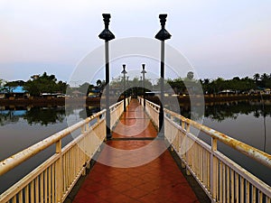 Small concrete bridge for walking across canal