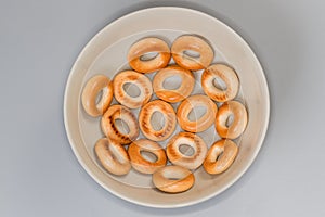 Small cookies ring shaped sushki in bowl, top view