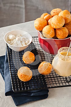 Small cottage cheese doughnuts castgnole served on a wire rack
