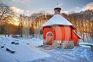 Small cottage church in winter scenery