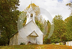 A small country church in fall.
