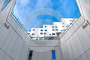 Small courtyard-well with a view of the bright blue sky