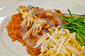 Small crabs deep fried with Thai pad-thai noodle stir-fried sweet & sour sauce with bean sprouts