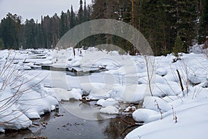 Small creek in Altai village Ust\'-Lebed\' in winter season