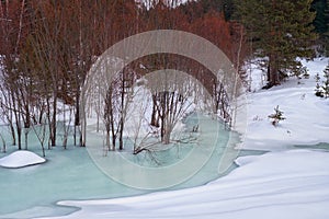 Small creek in Altai village Ust\'-Lebed\' in winter season photo