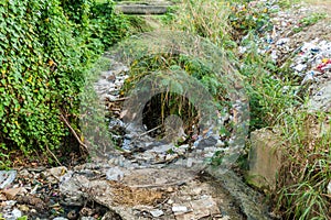 Small creek with a garbage in Sancti Spiritus, Cu