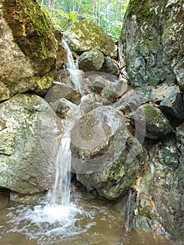 Small creek waterfall in Cheile Plaiului, Romania
